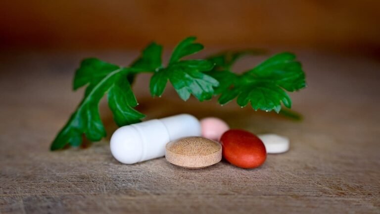 A diverse collection of dietary supplements including vitamins, minerals, and herbal products.